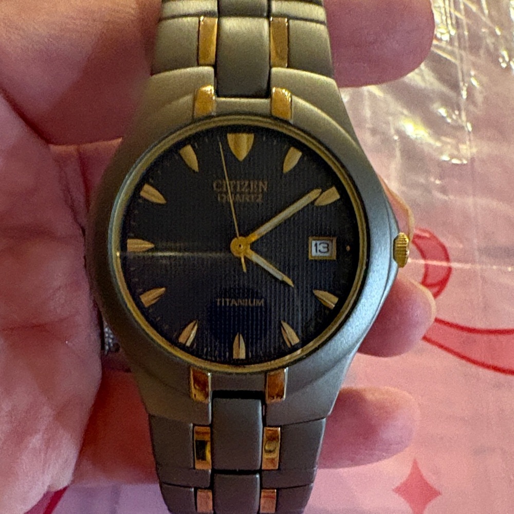 Citizen Titanium Watch with Black and Gold Accents